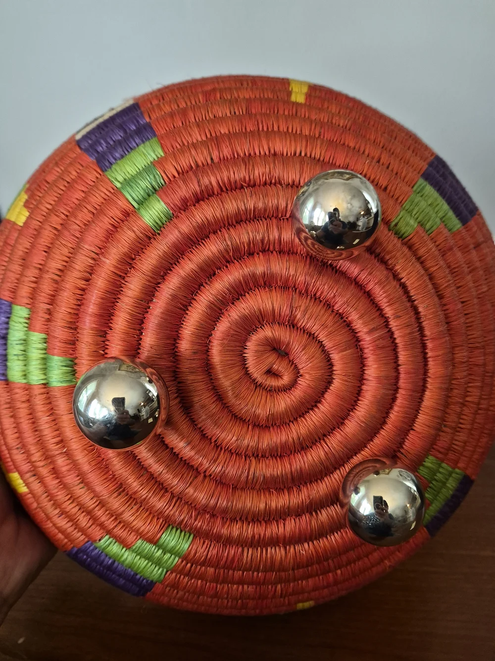 Cellia Handwoven orange Multicolor Decorative Bowl with Chrome Handles  Accents